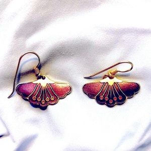 Earrings by famous jewelry designer Laurel Burch.